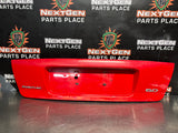 04-06 PONTIAC GTO LICENSE PLATE TRUNK FILLER PANEL TORRID RED OEM #1522