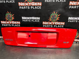 04-06 PONTIAC GTO LICENSE PLATE TRUNK FILLER PANEL TORRID RED OEM #1438