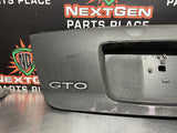 04-06 PONTIAC GTO LICENSE PLATE TRUNK FILLER PANEL OEM #784