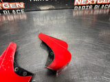 04-06 PONTIAC GTO TORRID RED ROCKER PANEL END CAPS PAIR OEM #1306
