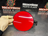 2004 PONTIAC GTO FUEL GAS DOOR ASSEMBLY TORRID RED OEM 92119899 #1438
