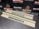 2011 FORD MUSTANG GT LH AND RH ILLUMINATED DOOR SILL TRIM SET TAN OEM #1357
