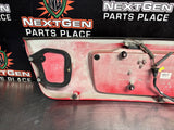 04-06 PONTIAC GTO LICENSE PLATE TRUNK FILLER PANEL TORRID RED OEM #1438