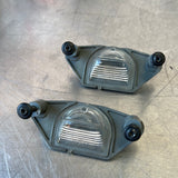05-13 C6 CORVETTE LICENSE PLATE LAMP SET of 2 USED 16519986 OEM